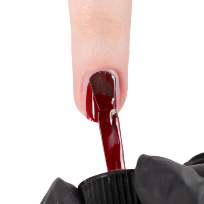 Application of Gel Nail Polish SP644 Deep Love