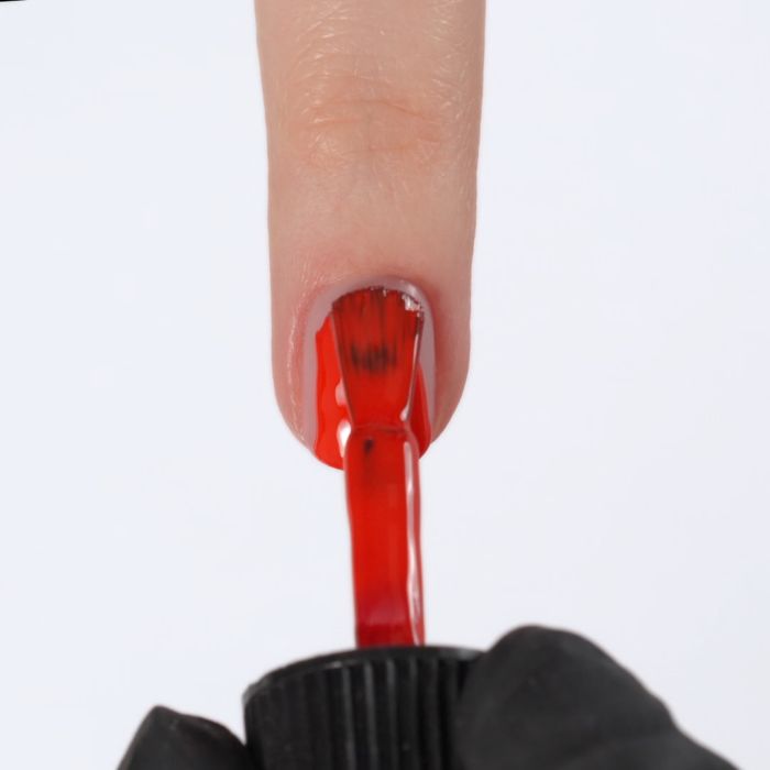 Application of Gel Nail Polish SP324 Ruby Red