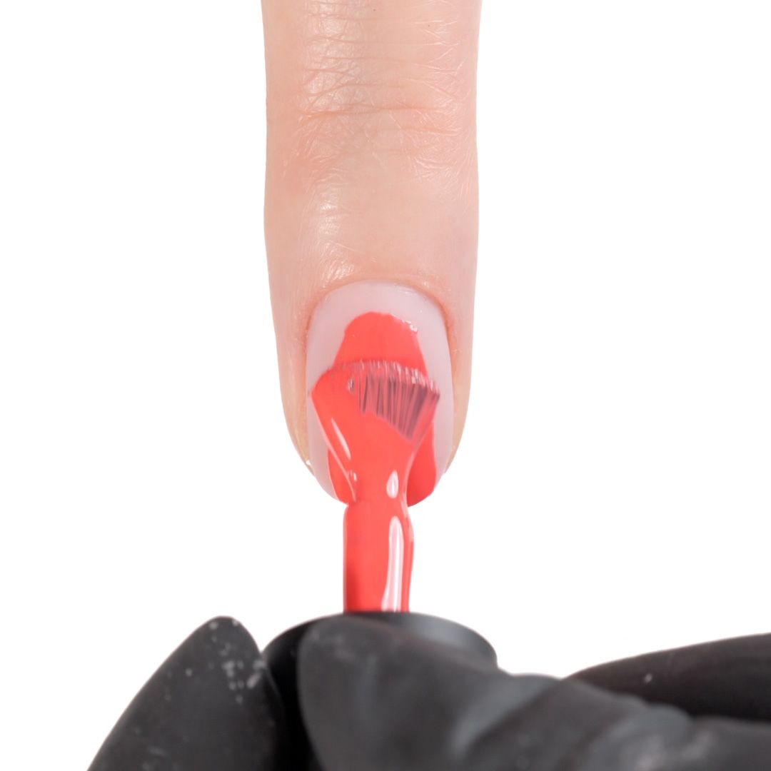 Application of Gel Nail Polish GPC25 Coral 