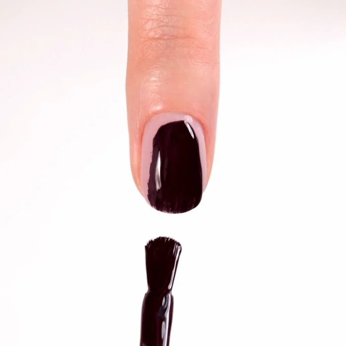 Application of Gel Nail Polish SP588 Rebel Plum