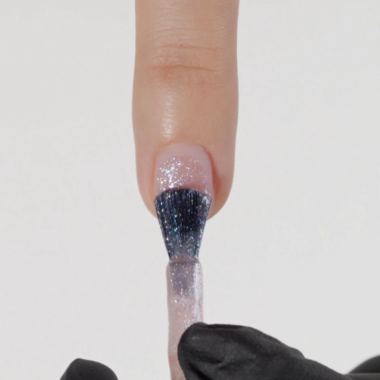 Aplicación de Esmalte semipermanente SP773 Pinky Glitz