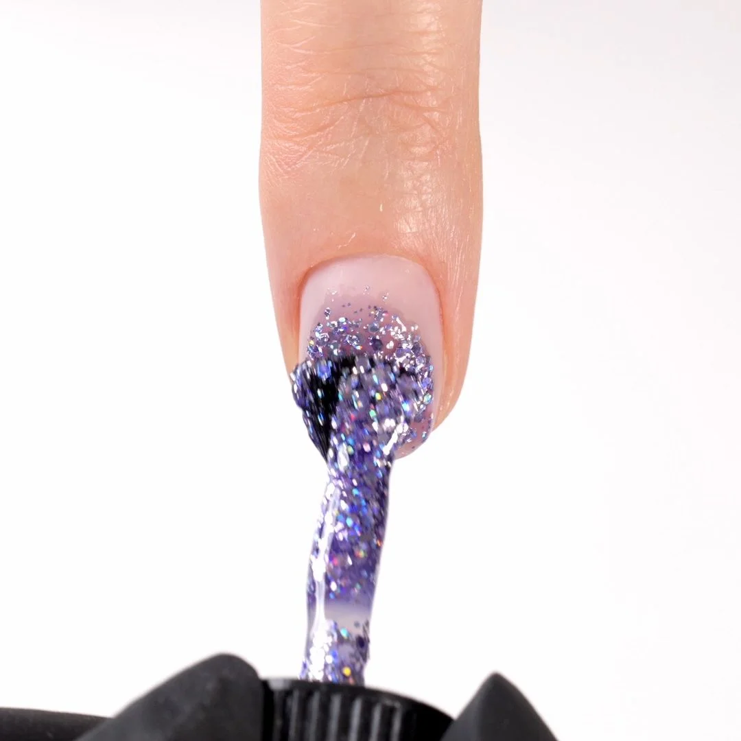 Application of Gel Nail Polish SP334 Violet Starlight