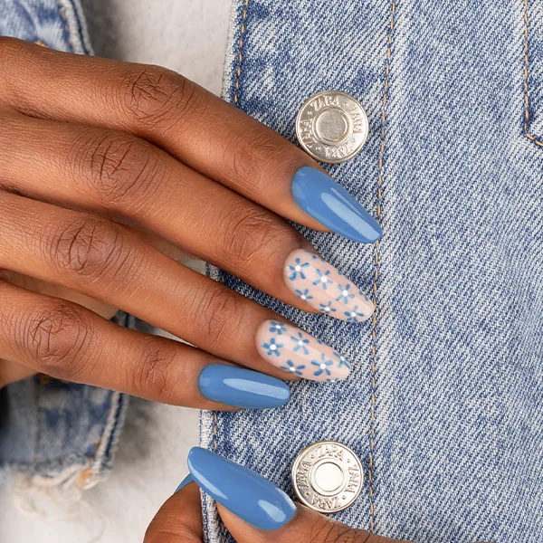 Passione Beauty pastel blue glossy gel polish with floral nail art on almond nails, spring manicure professional for nail artists