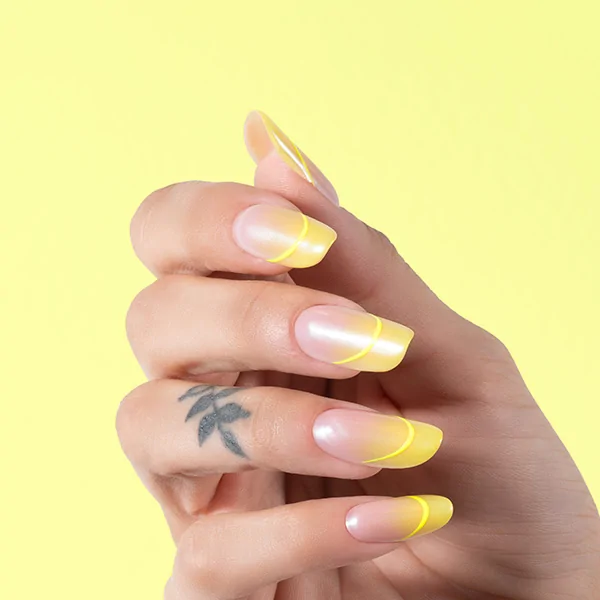 Passione Beauty neon yellow French gel polish on square nails, glossy fade effect modern nail art manicure