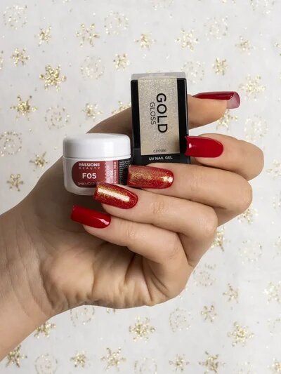unghie_rosse_con_finish_dorato